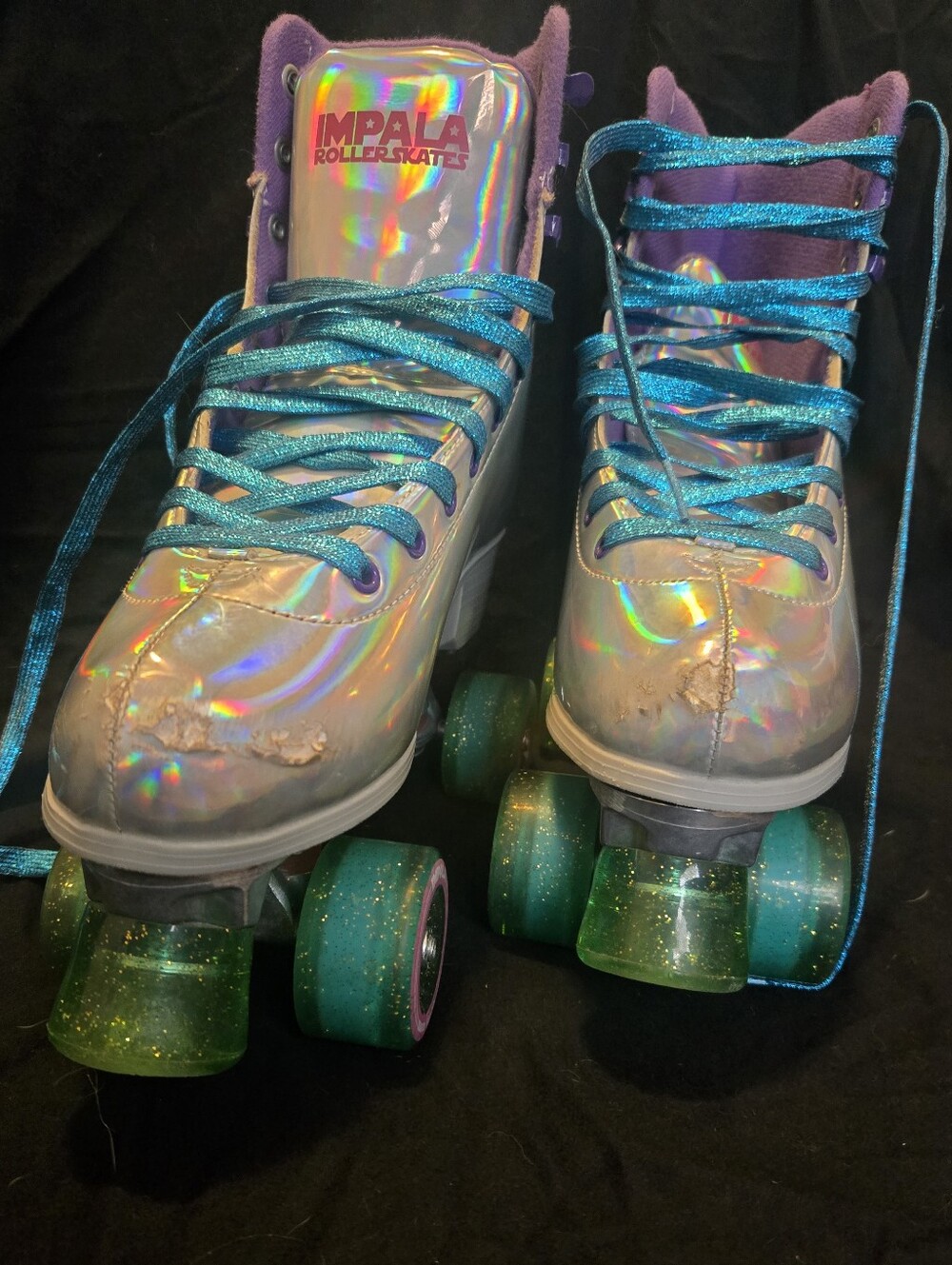 Holographic Size 11 Women Impala Rollerskates.